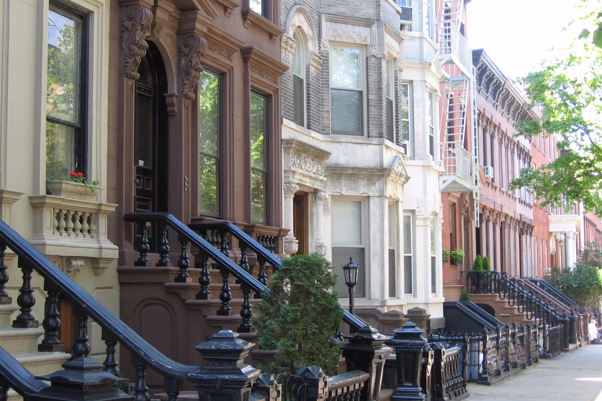 Detailed townhouse facades and stoops in Greenpoint