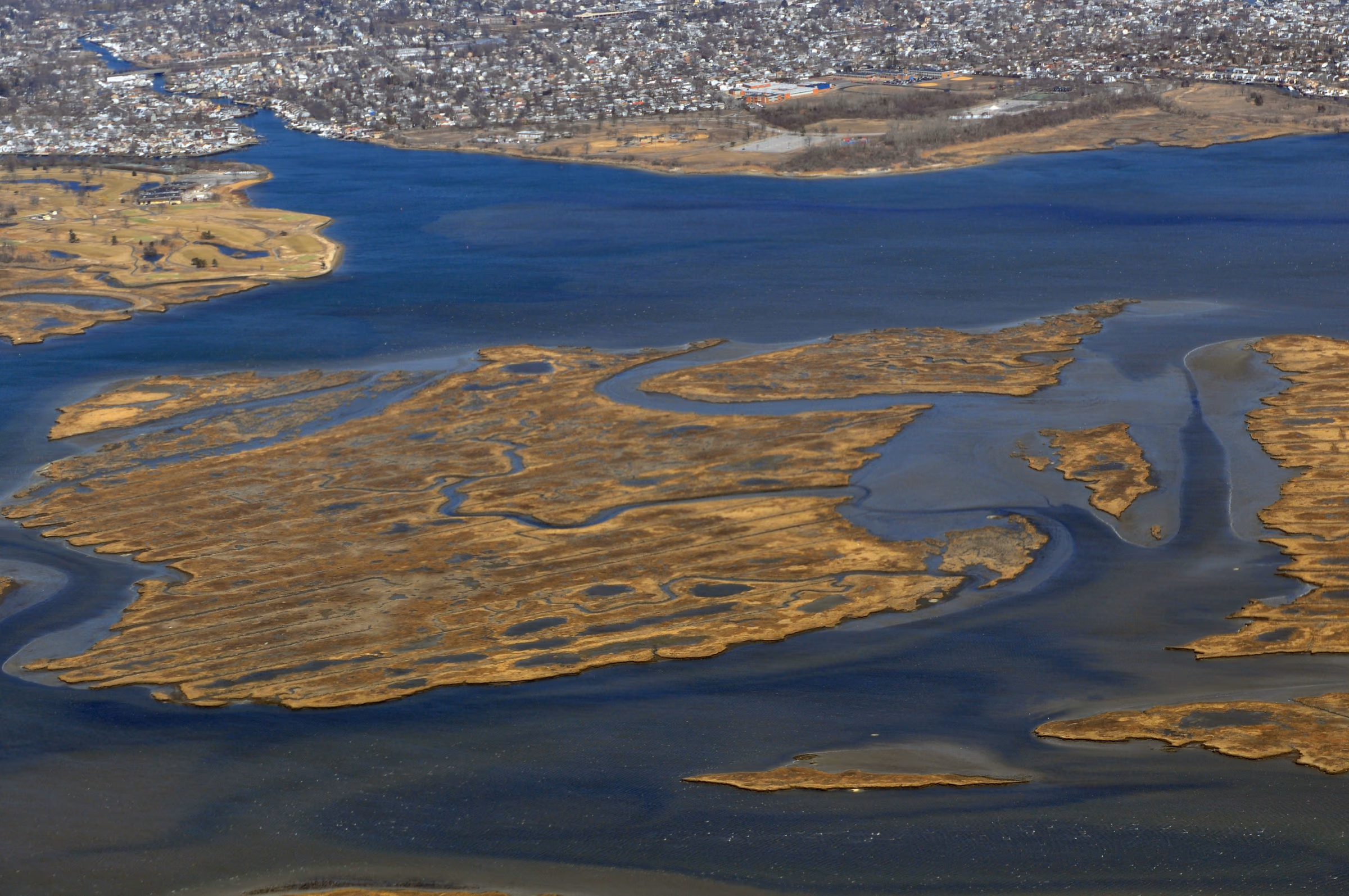 Aerial view of coastal marshes and waterways at Lido Beach, New York