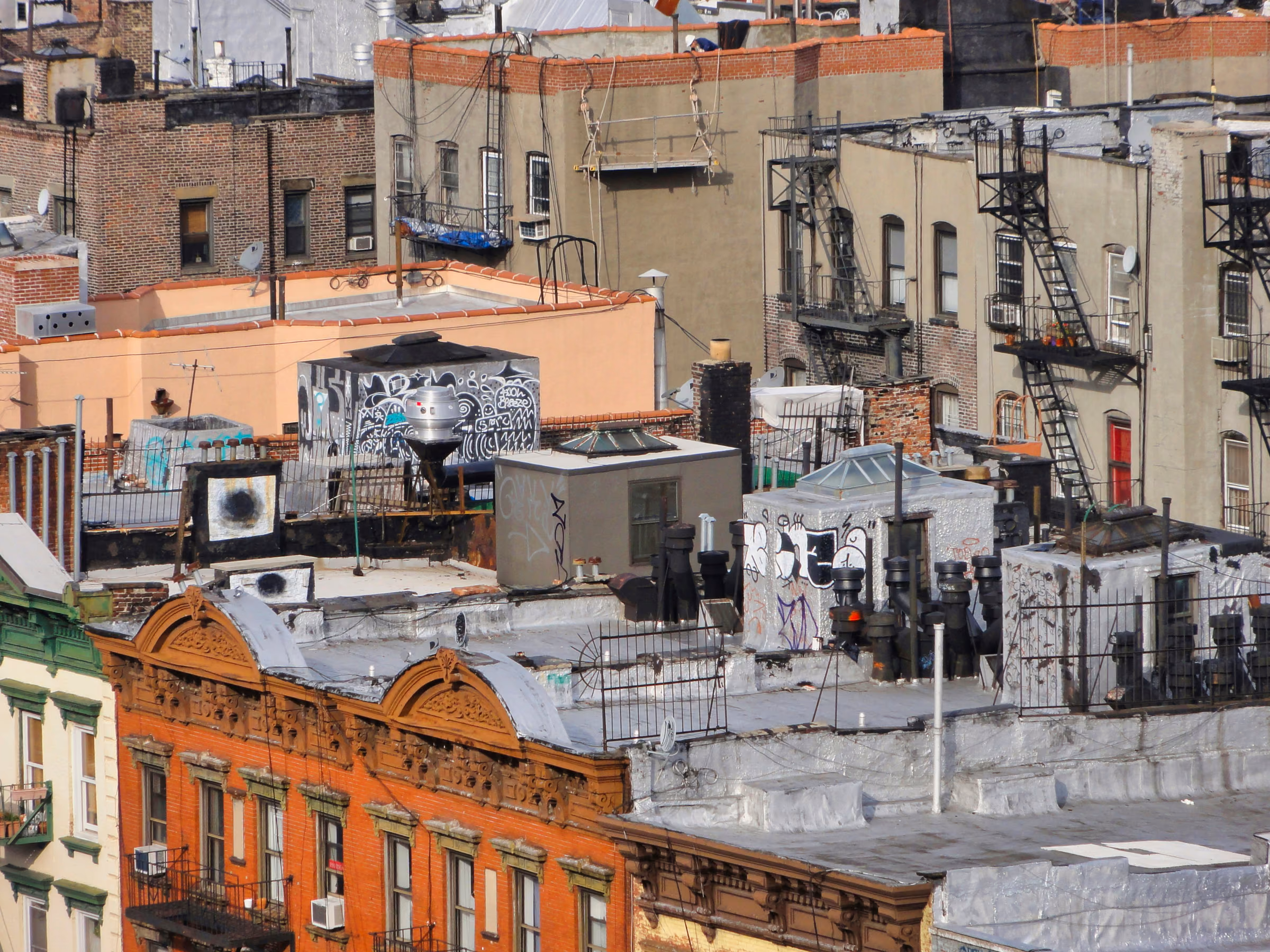 Rooftops, fire escapes, and masonry buildings on the Lower East Side, Manhattan.