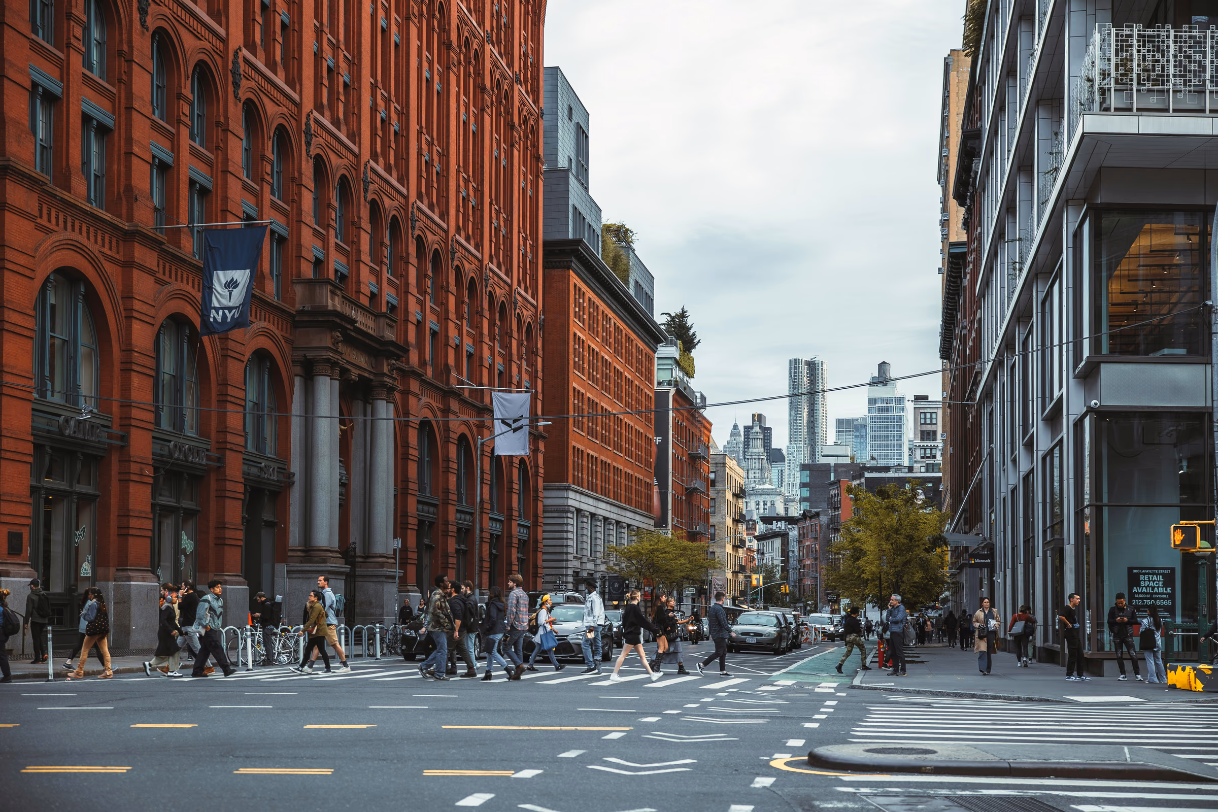 The red-brick Puck Building and Lafayette Street at Houston Street in Nolita, Manhattan.