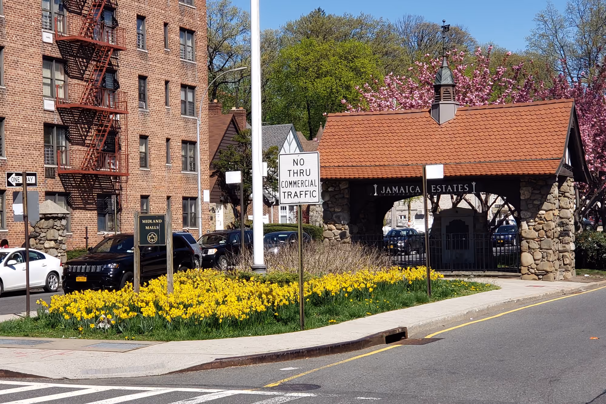 The landscaped Jamaica Estates memorial in spring