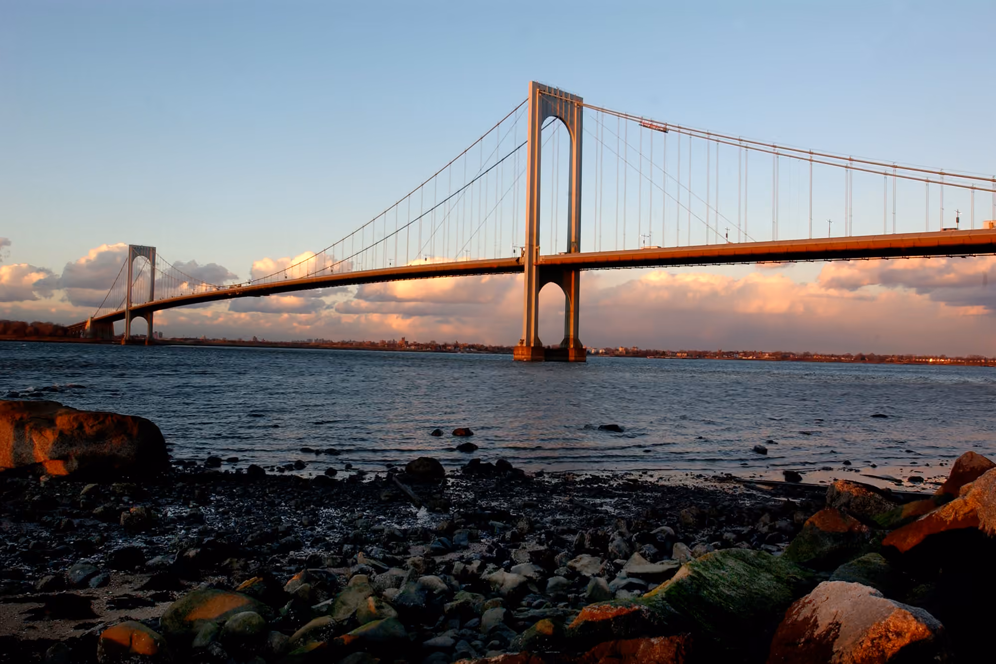Bronx–Whitestone Bridge above the East River at sunset
